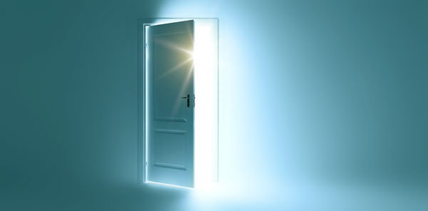 A door with light shining through it